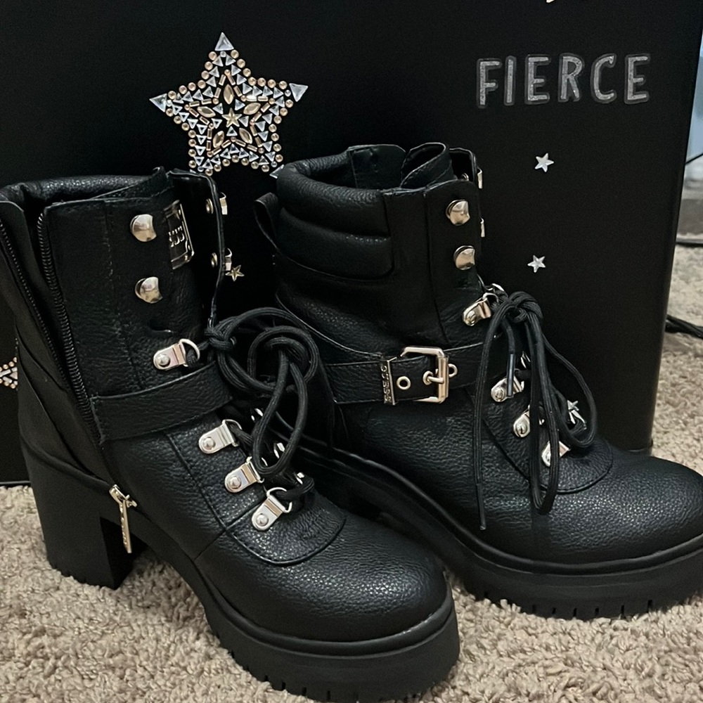 Black heeled boots with zipper